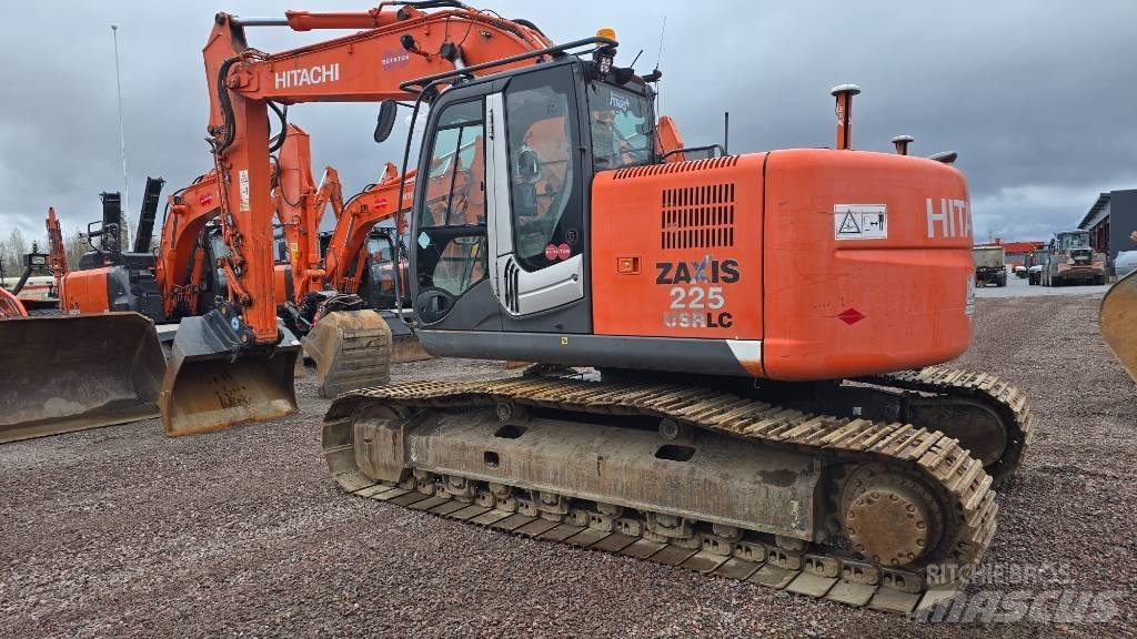 Hitachi ZX225USRLC-3 Bandgrävare