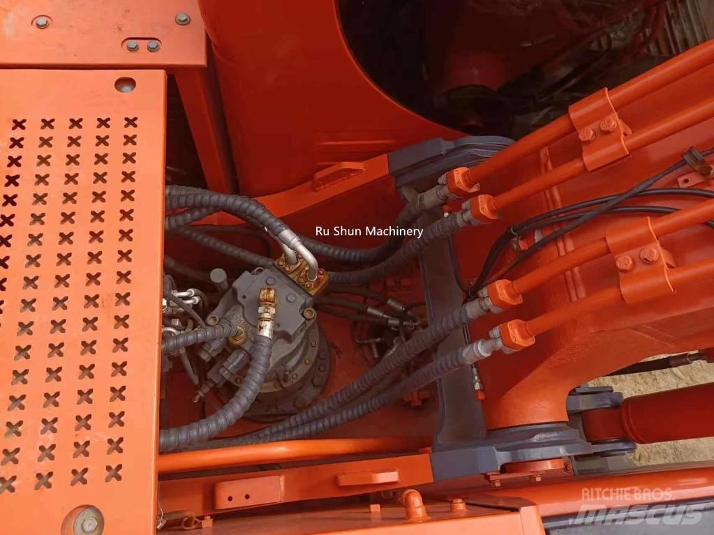 Doosan DX 225 LC Bandgrävare