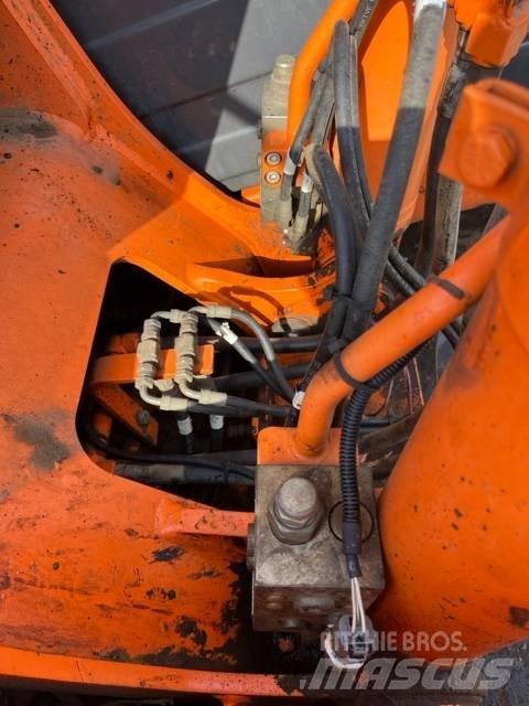 Doosan DX 140 LC Bandgrävare
