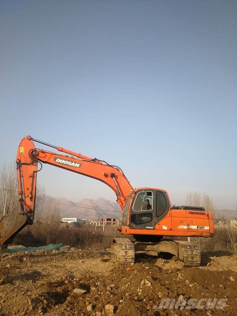 Doosan dx225 Bandgrävare