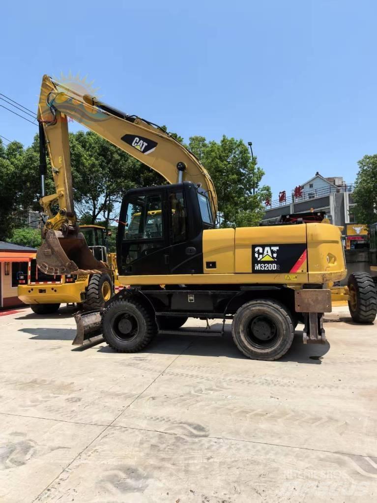 CAT M 315 D2 Hjulgrävare