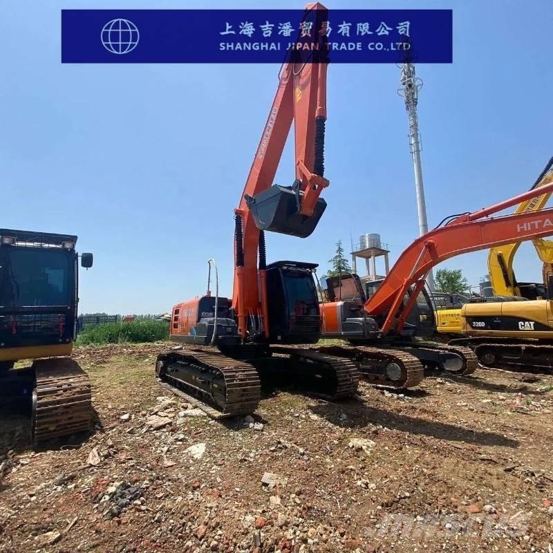 Hitachi ZX 210 Bandgrävare