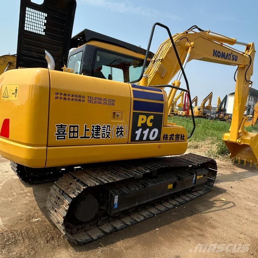 Komatsu 110 Bandgrävare