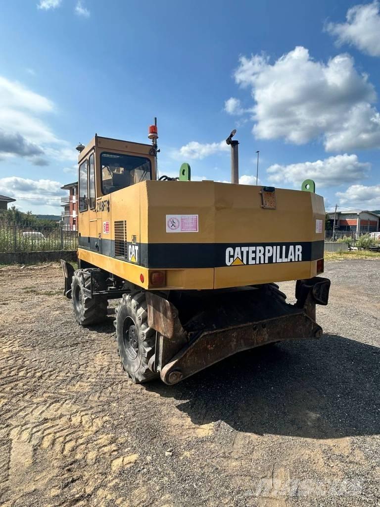 CAT 214 Hjulgrävare