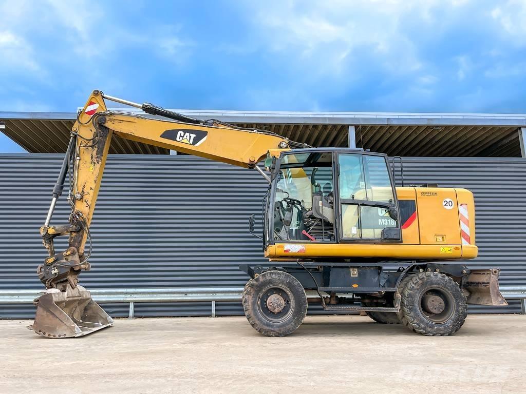 CAT M318F Hjulgrävare