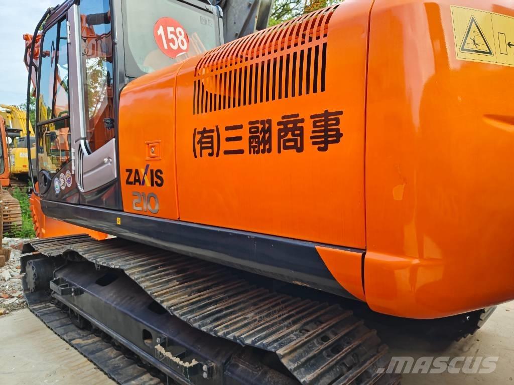 Hitachi ZX 210 Bandgrävare