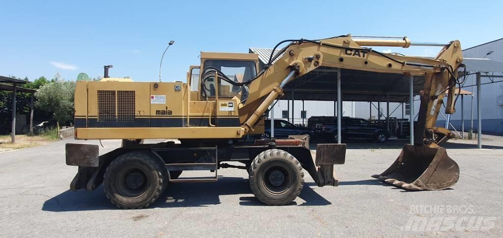 CAT 214 B Hjulgrävare