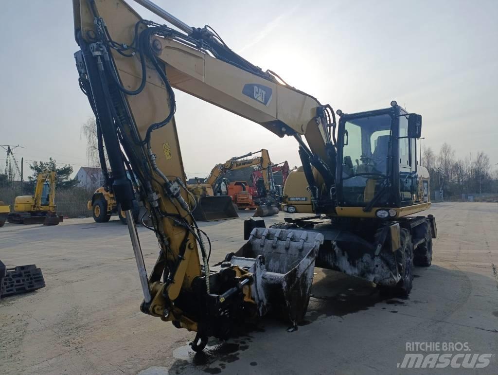 CAT M 313 D Hjulgrävare