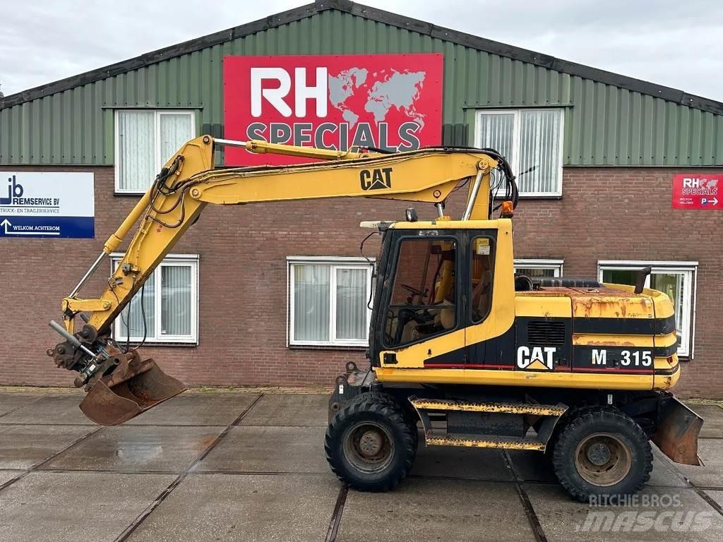 CAT M315 +ROTO CE Hjulgrävare