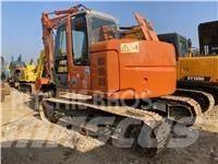 Hitachi ZX 135 US Bandgrävare
