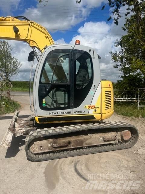 New Holland E 70 SR Midigrävmaskiner 7t - 12t