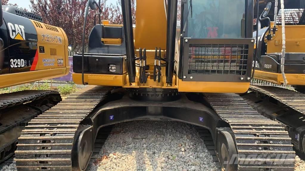 CAT 323 D L Bandgrävare
