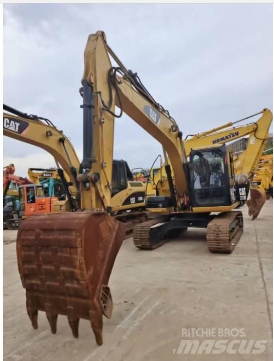 CAT 313 D Bandgrävare