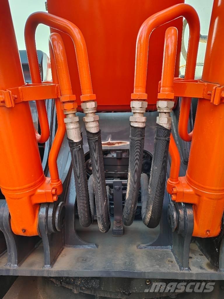 Hitachi ZX 210 Bandgrävare
