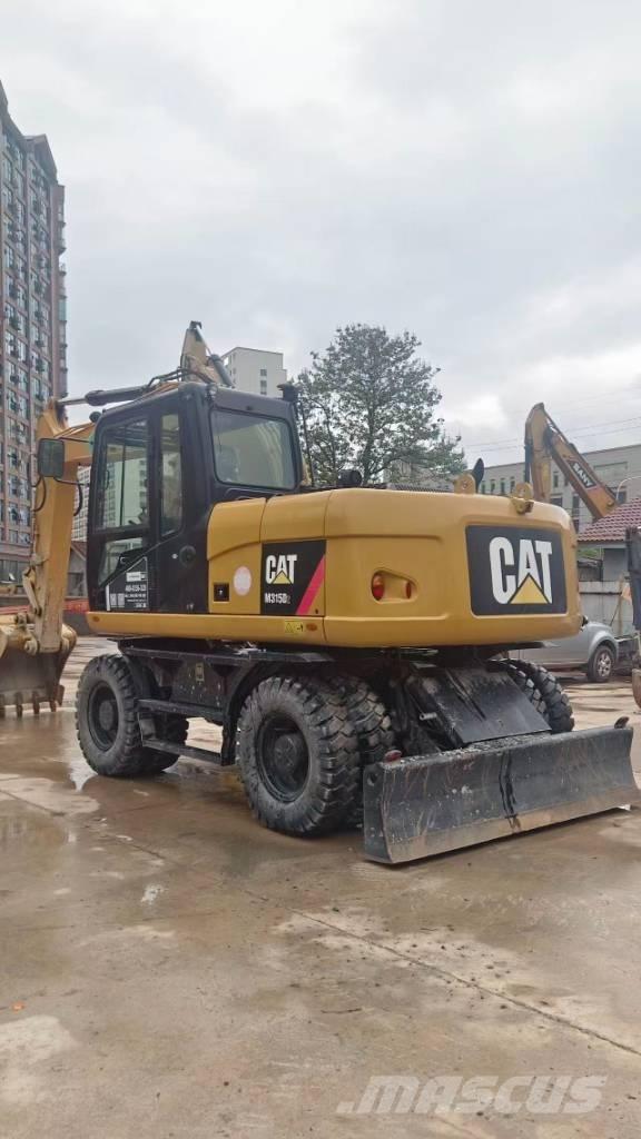 CAT M 315 D Hjulgrävare