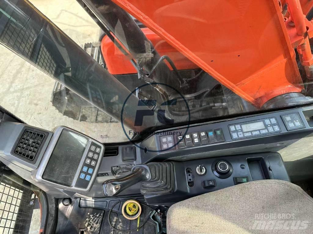 Doosan DX 140 Bandgrävare
