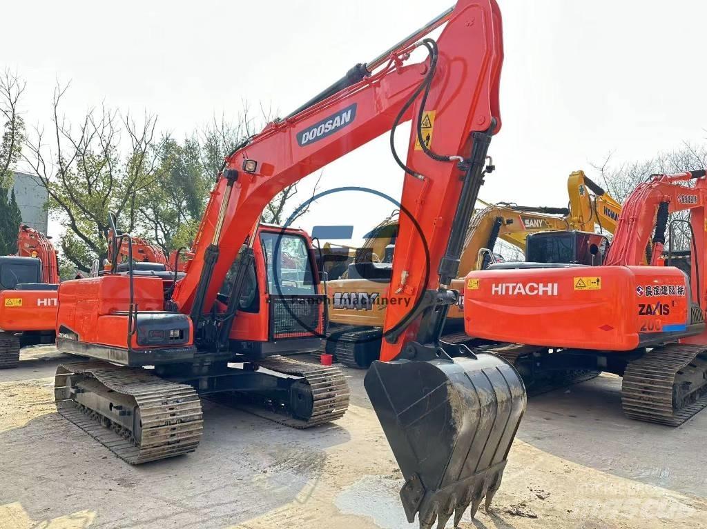 Doosan DX 140 Bandgrävare