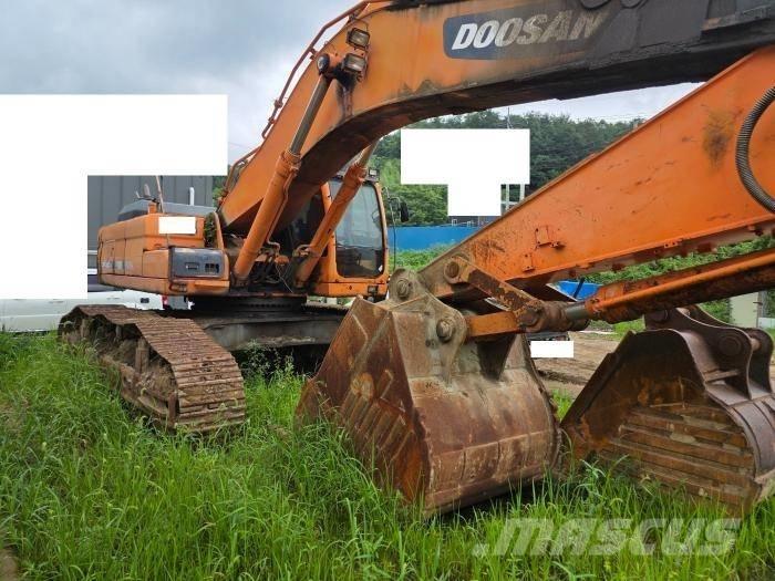Doosan DX 520 LC Bandgrävare