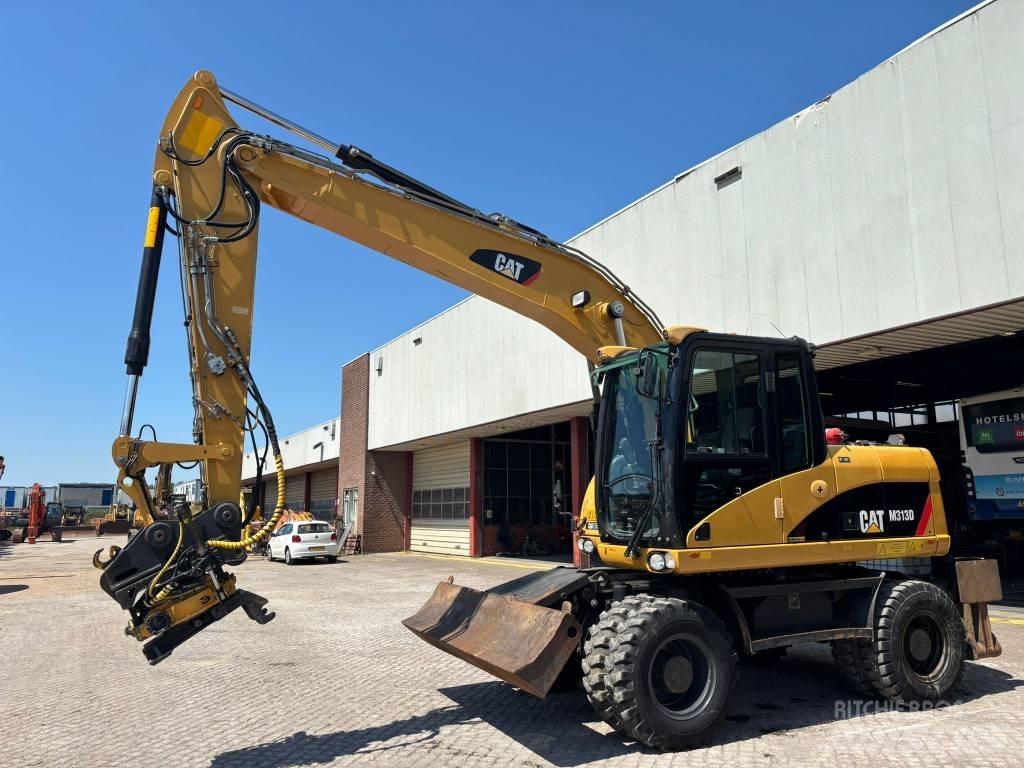 CAT M 313 D Hjulgrävare