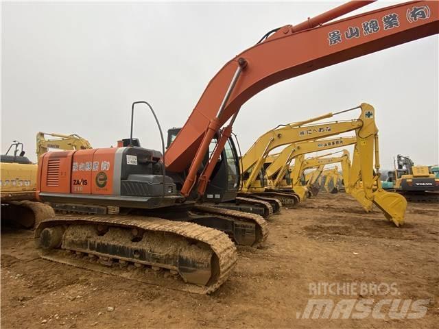 Hitachi ZX210-3 Bandgrävare