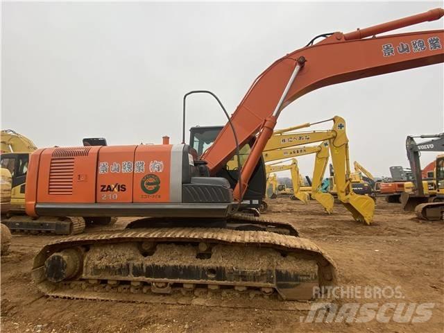 Hitachi ZX210-3 Bandgrävare