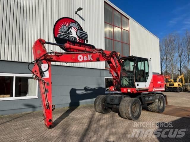 O&K MH 5 Compact Bommar och stickor