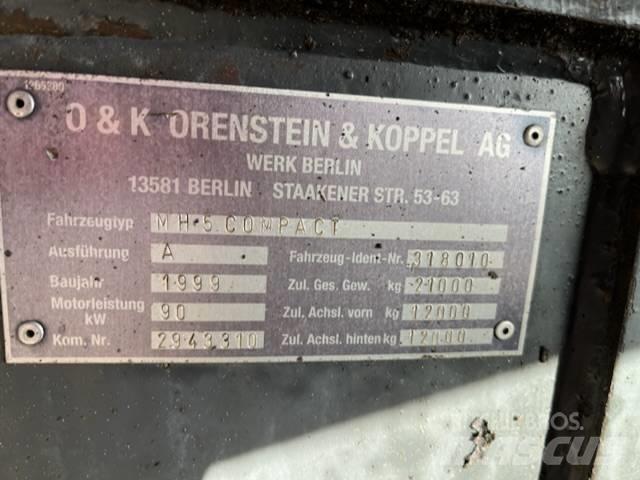 O&K MH 5 Compact Bommar och stickor
