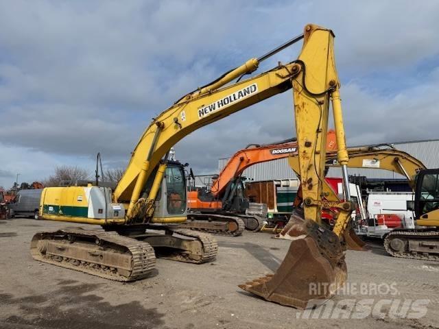New Holland E 215 Bandgrävare