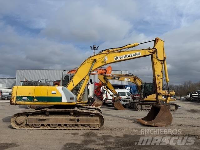 New Holland E 215 Bandgrävare