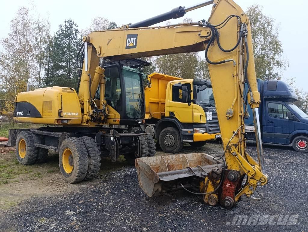 CAT M 318 C Hjulgrävare