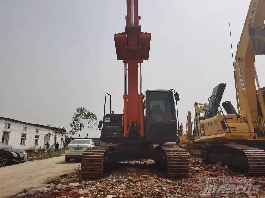 Hitachi ZX 210 Bandgrävare
