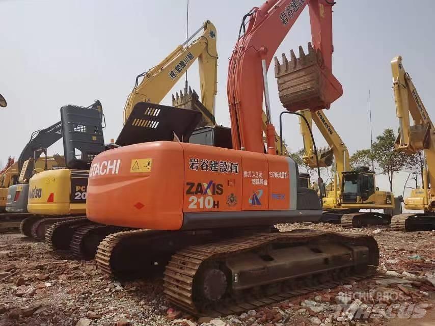 Hitachi ZX 210 Bandgrävare