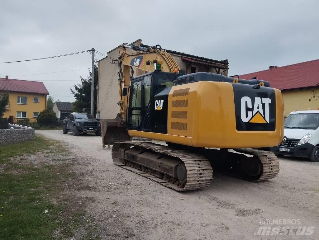 CAT 320 FL Bandgrävare