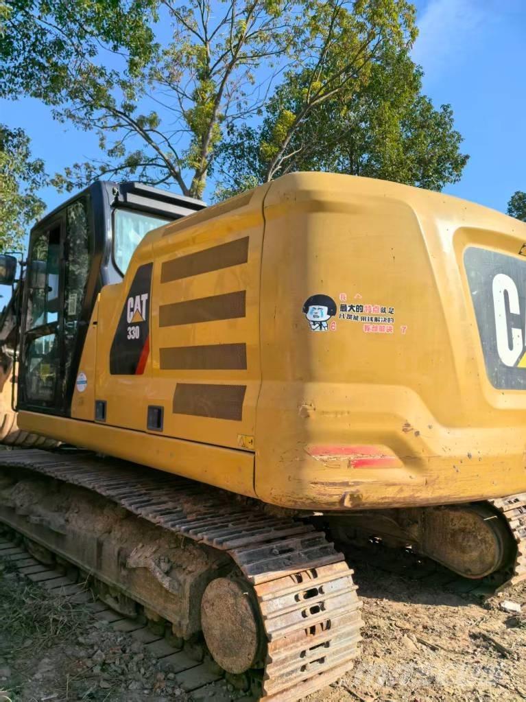 CAT 323 Bandgrävare
