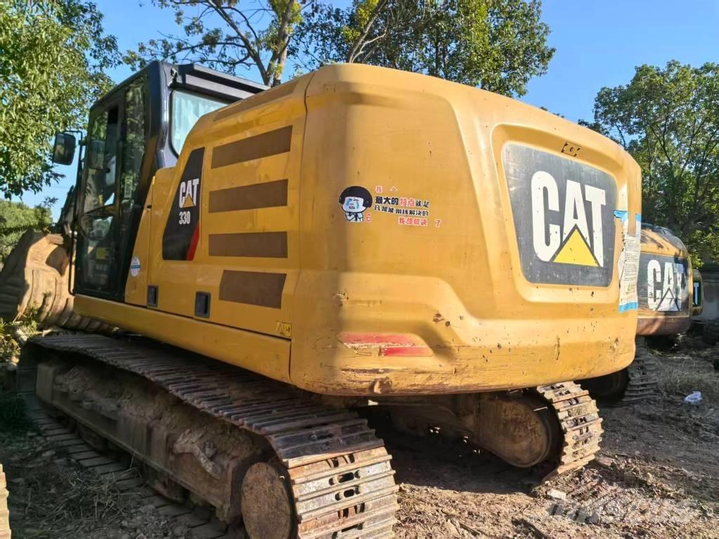 CAT 323 Bandgrävare