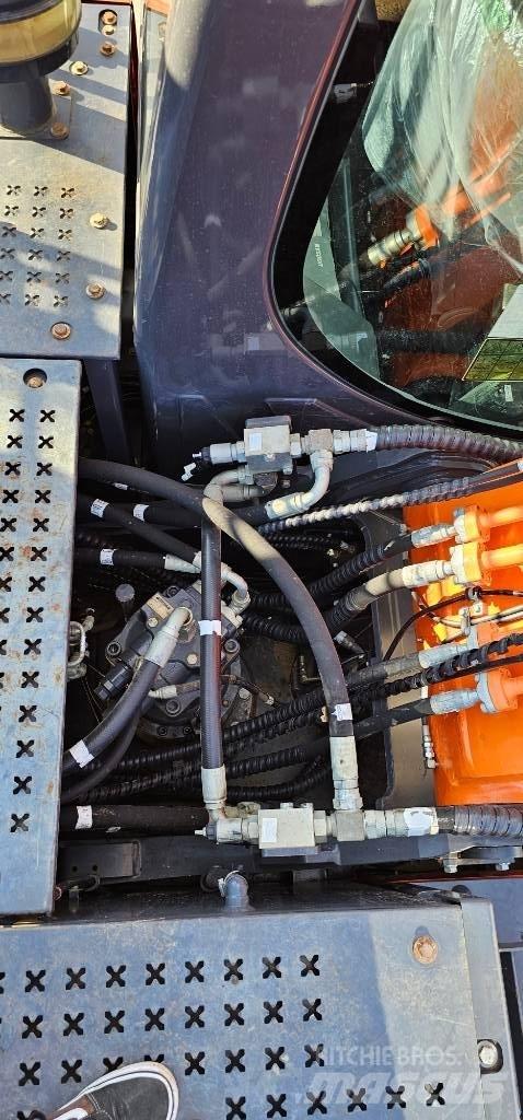 Doosan DX 225 Bandgrävare