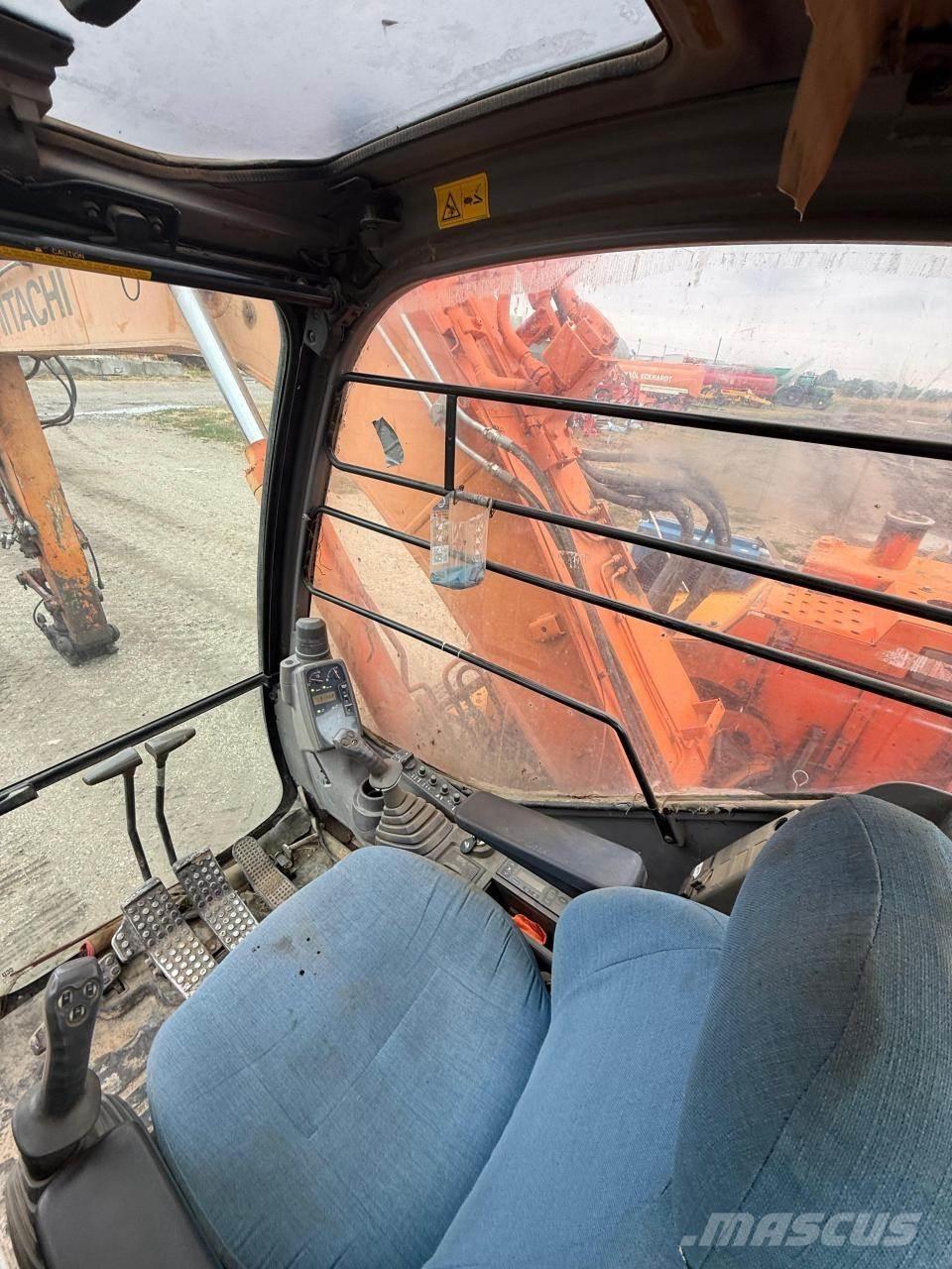 Hitachi ZX135US Bandgrävare