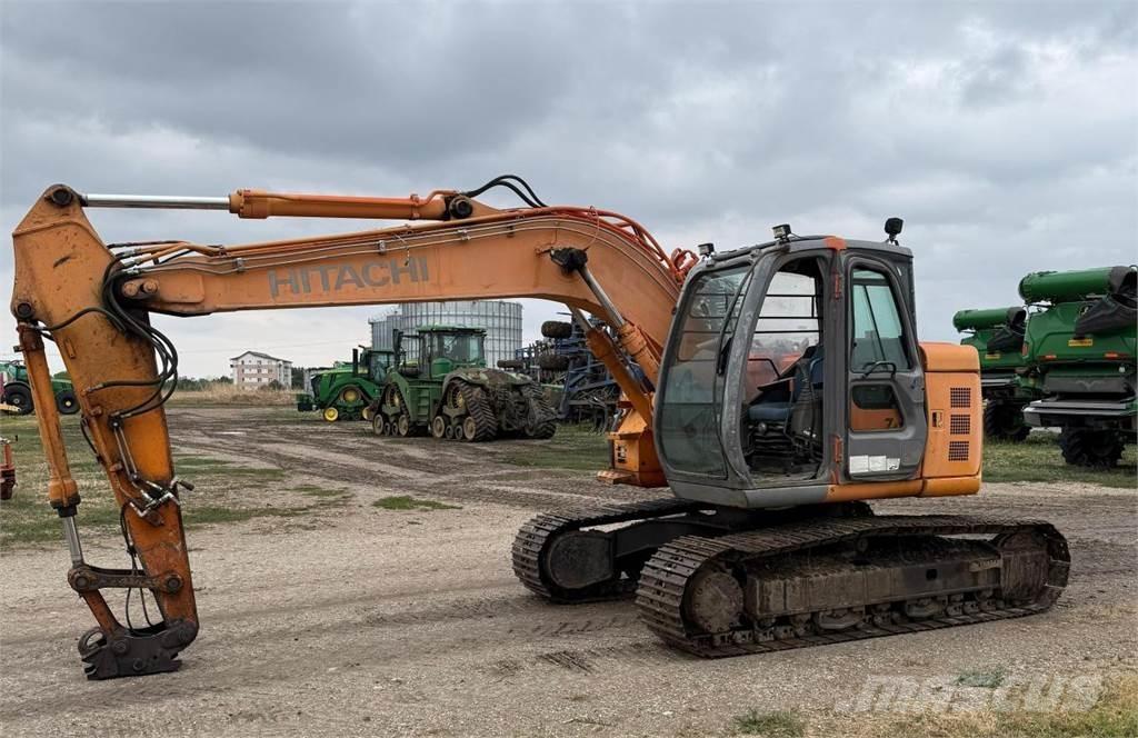 Hitachi ZX135US Bandgrävare