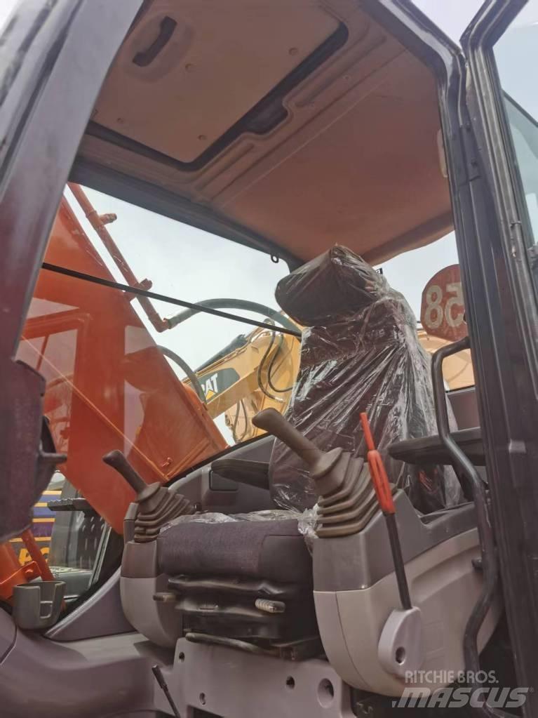 Hitachi ZX 210 Bandgrävare