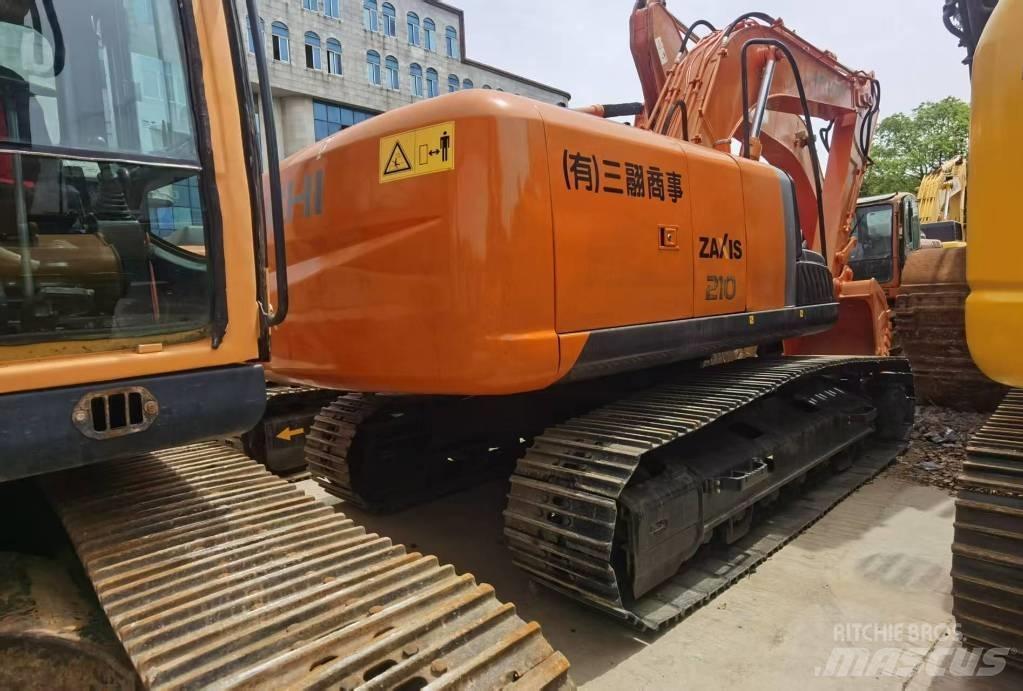 Hitachi ZX 210 Bandgrävare