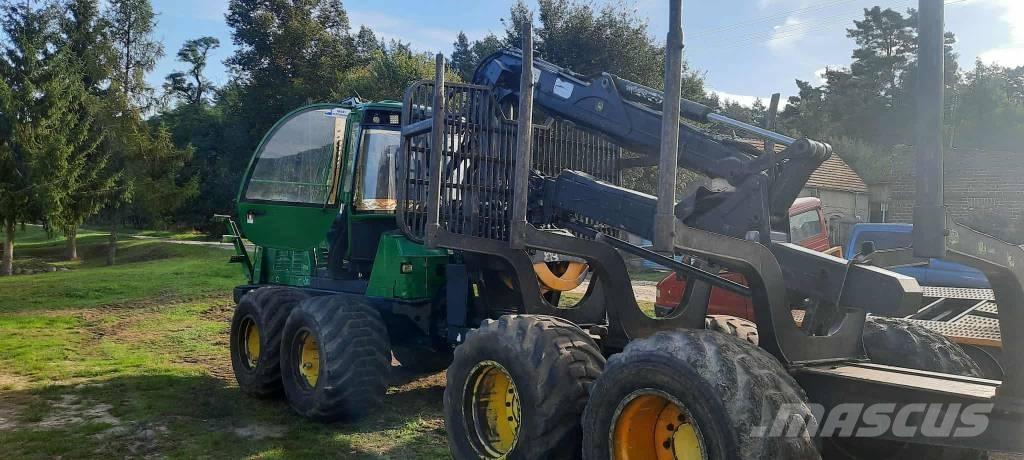 John Deere 1110 E Skotare