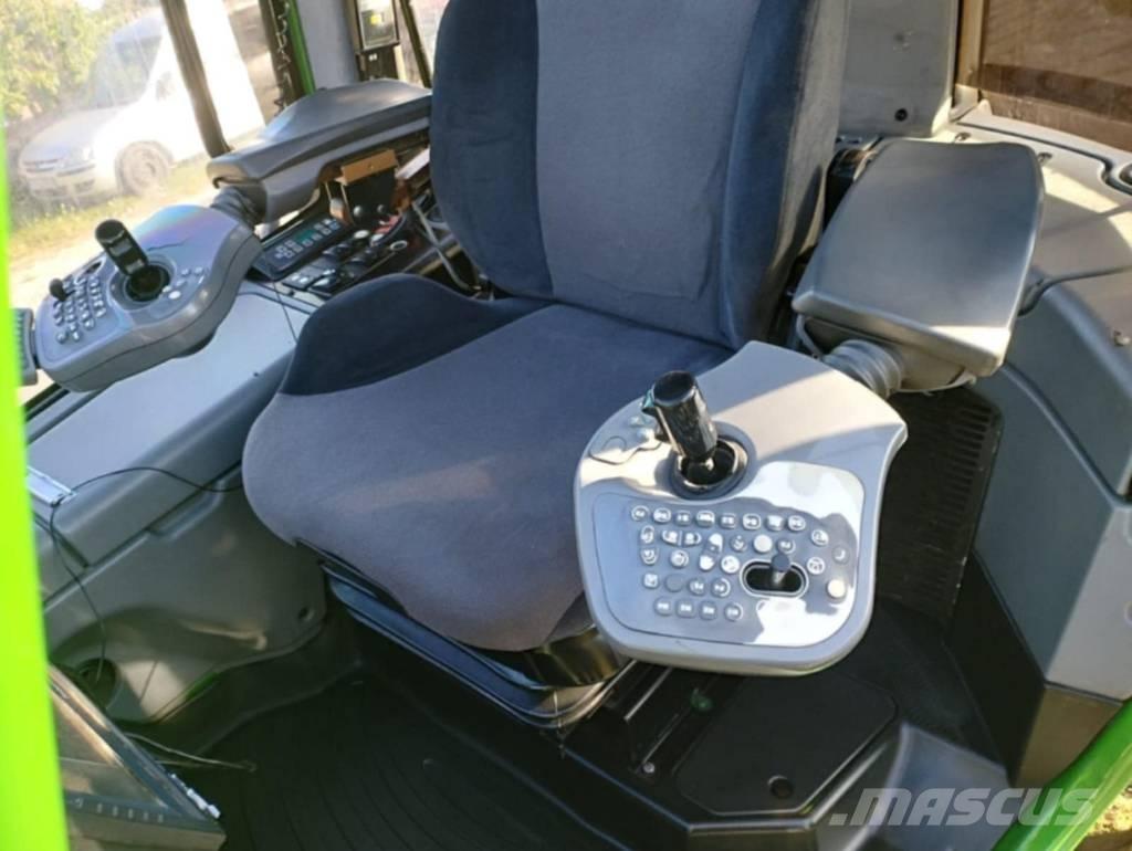 John Deere 1110 E Skotare