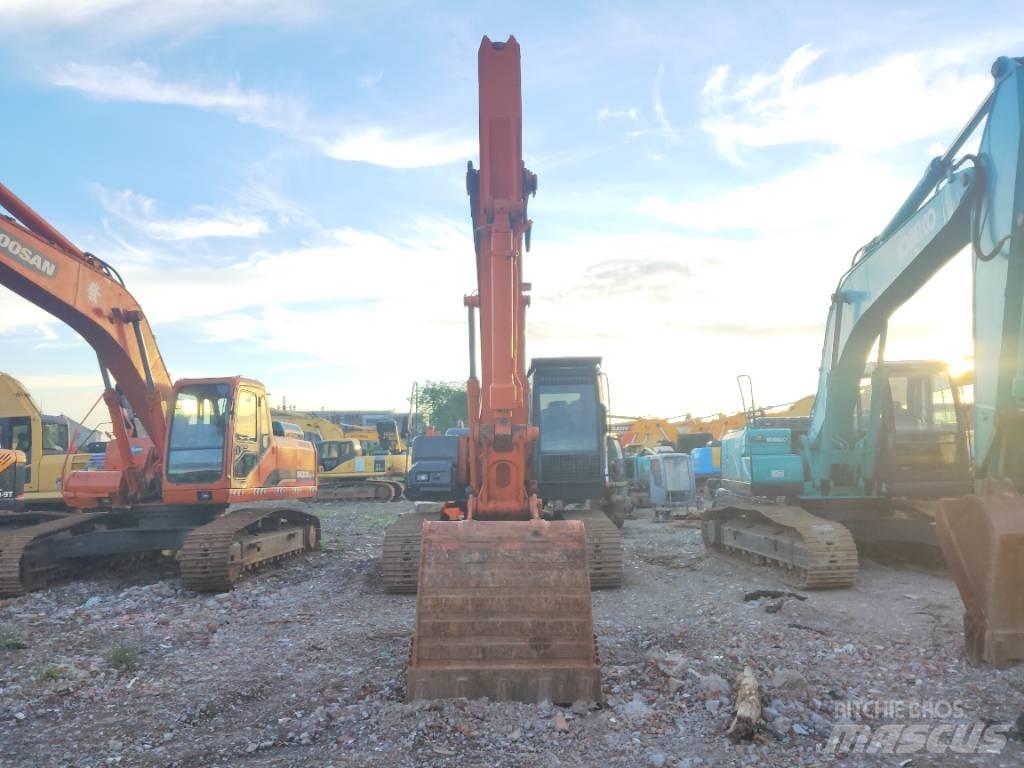 Hitachi ZX 210 Bandgrävare