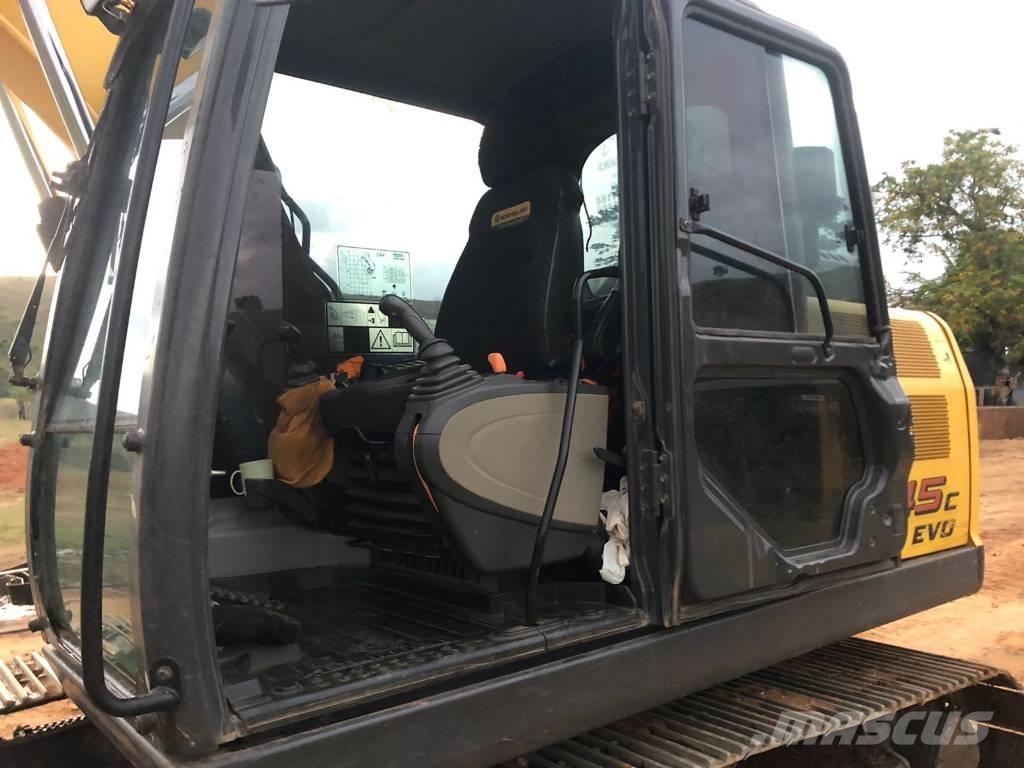 New Holland E 145 Bandgrävare