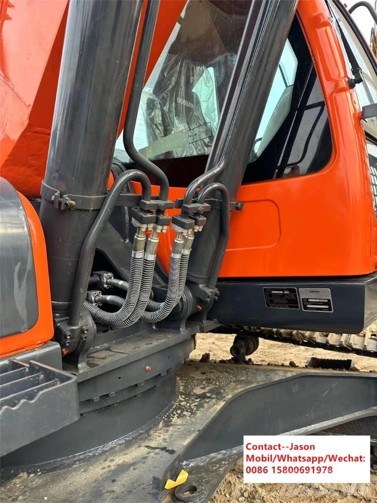 Doosan DX 225 LCA Bandgrävare