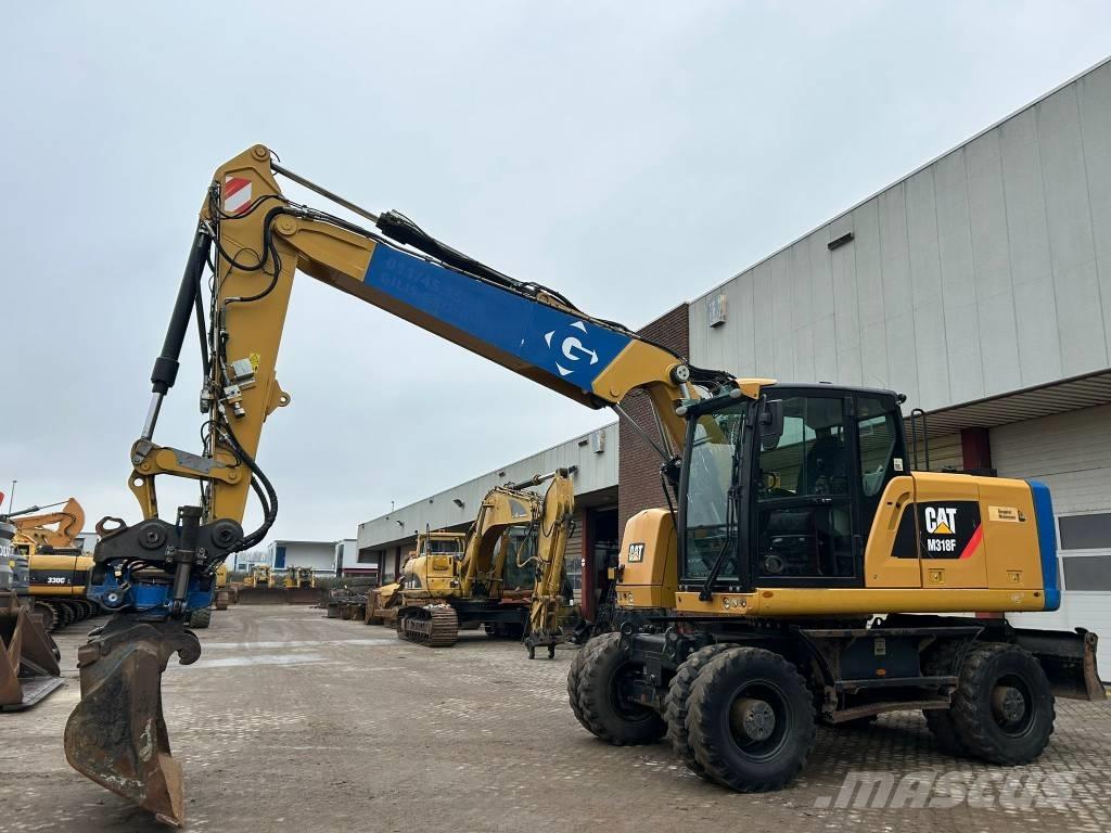 CAT M 318 F Hjulgrävare