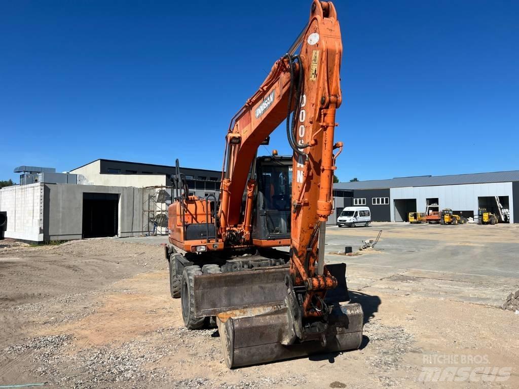 Doosan DX 140 W Hjulgrävare