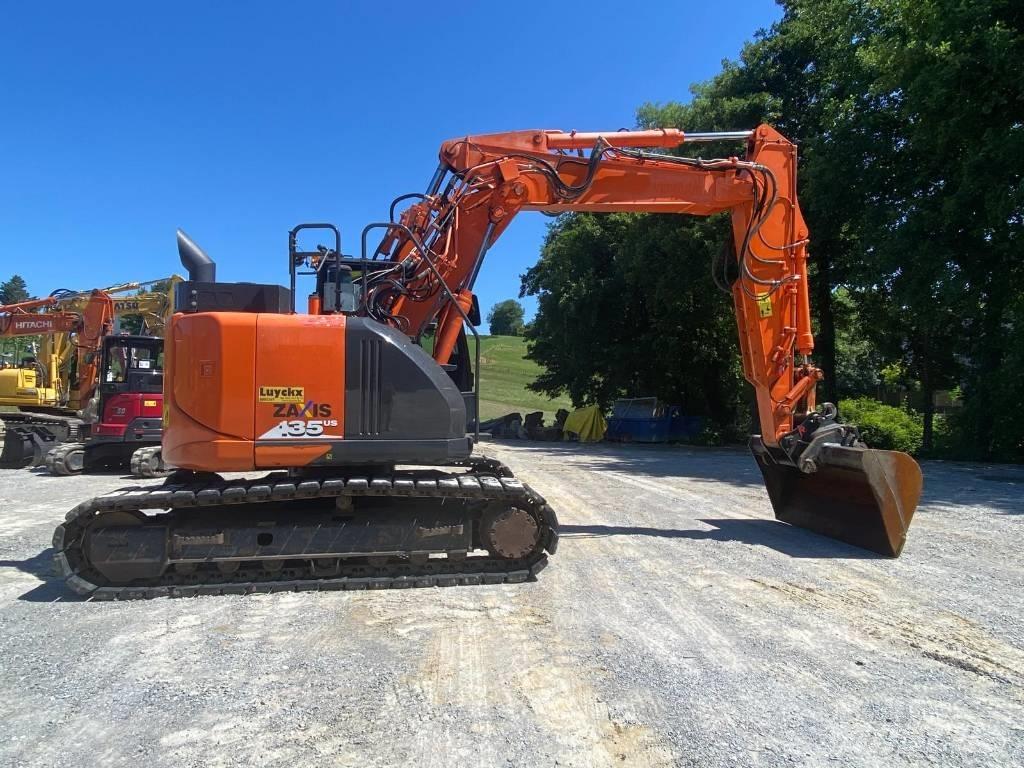 Hitachi ZX 135 US-6 Bandgrävare