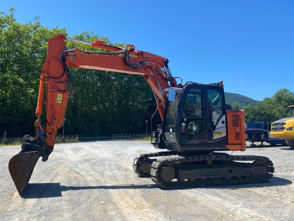 Hitachi ZX 135 US-6 Bandgrävare