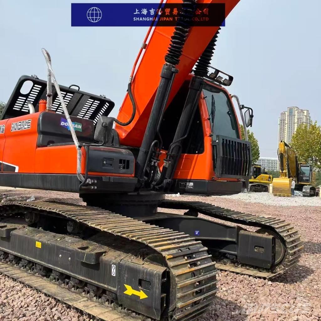 Doosan DX 225 Bandgrävare